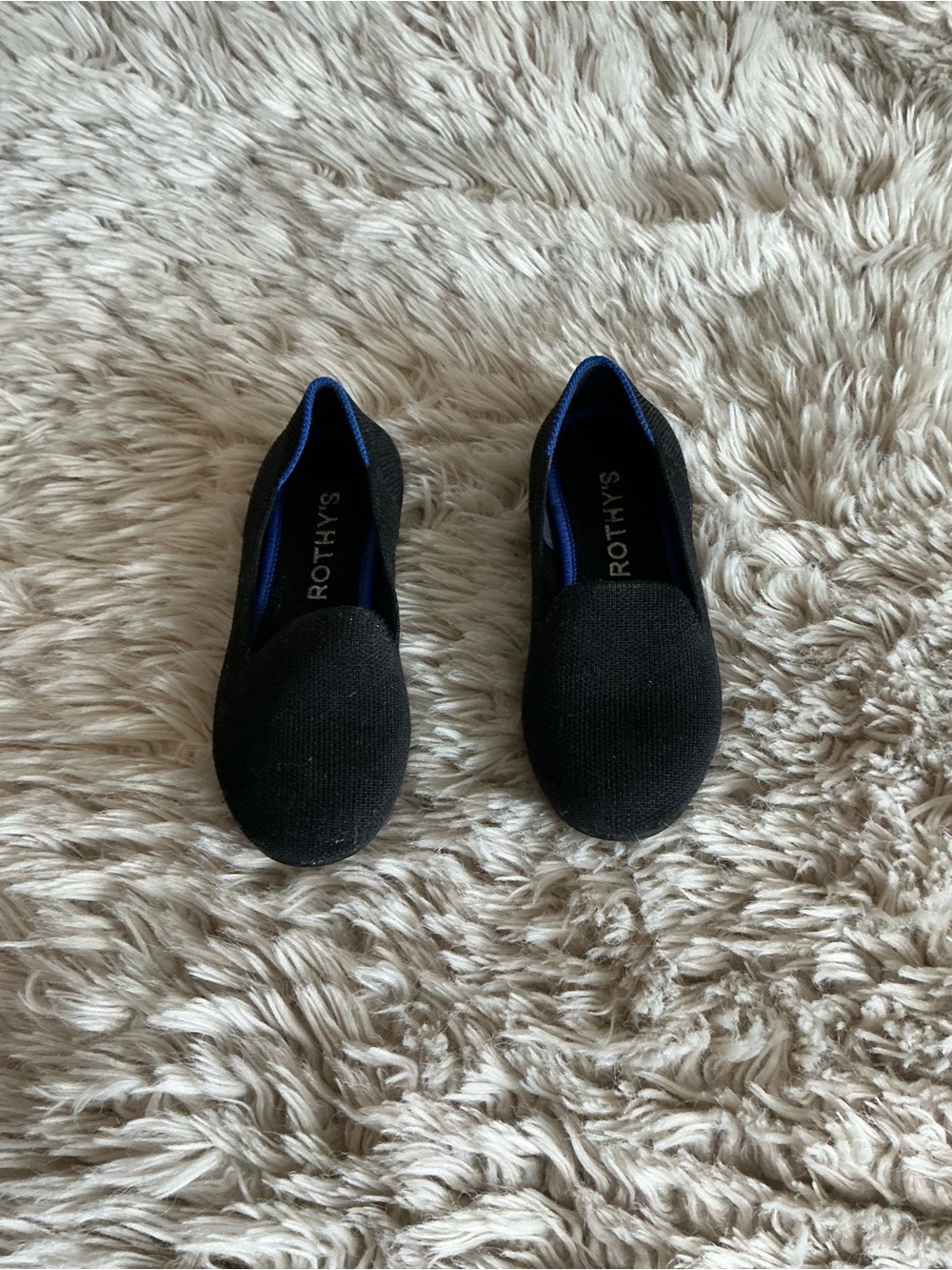 Rothy's Kids Black Slip-Ons with Blue Trim